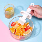 Brushing chicken with oil